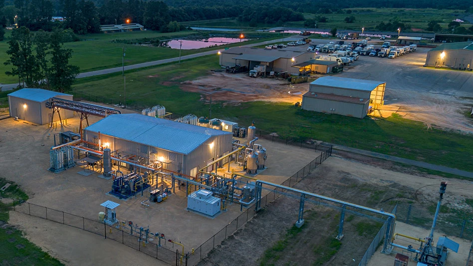 A drone shot showcasing the Renewable Natural Gas plant at night